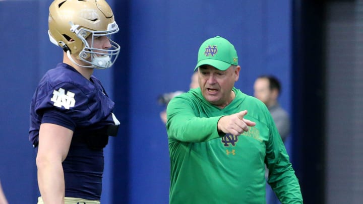 Notre Dame Offensive Coordinator Mike Denbrock talks to players at Notre Dame spring football practice Thursday, March 7, 2024, at the Irish Athletics Center in South Bend.