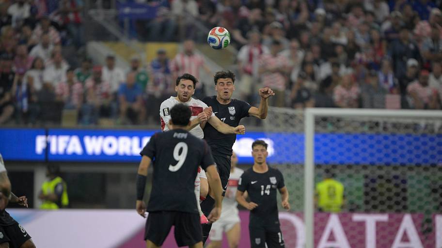 gio reyna up for a header
