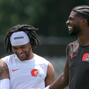 Browns quarterback Shedeur Sanders (right) chats with wide receiver Gage Larvadain after practice, Tuesday, June 10, 2025, in Berea.