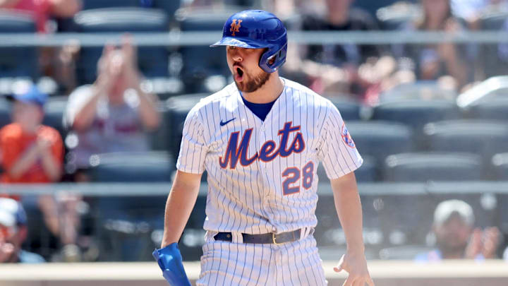 Jun 20, 2022; New York City, New York, USA; New York Mets designated hitter J.D. Davis (28) reacts after scoring against the Miami Marlins on a sacrifice fly by third baseman Eduardo Escobar (not pictured) during the fourth inning at Citi Field. Mandatory Credit: Brad Penner-Imagn Images