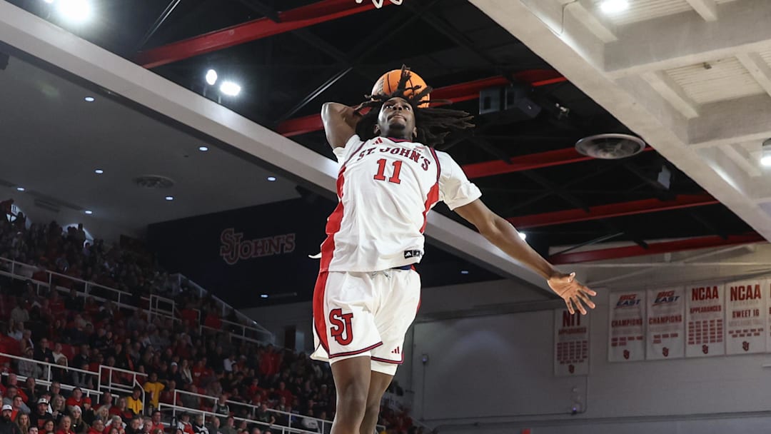 Nov 15, 2025; Queens, New York, USA;  St. John's basketball guard Ian Jackson (11) goes up for a dunk in the second half against the William & Mary Tribe at Carnesecca Arena.