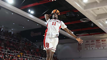 Nov 15, 2025; Queens, New York, USA;  St. John's basketball guard Ian Jackson (11) goes up for a dunk in the second half against the William & Mary Tribe at Carnesecca Arena.