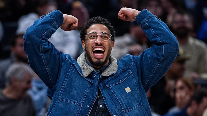 Jan 14, 2026; Indianapolis, Indiana, USA; Indiana Pacers guard Tyrese Haliburton (0) reacts to a dunk in the second half against the Toronto Raptors at Gainbridge Fieldhouse. Mandatory Credit: Trevor Ruszkowski-Imagn Images