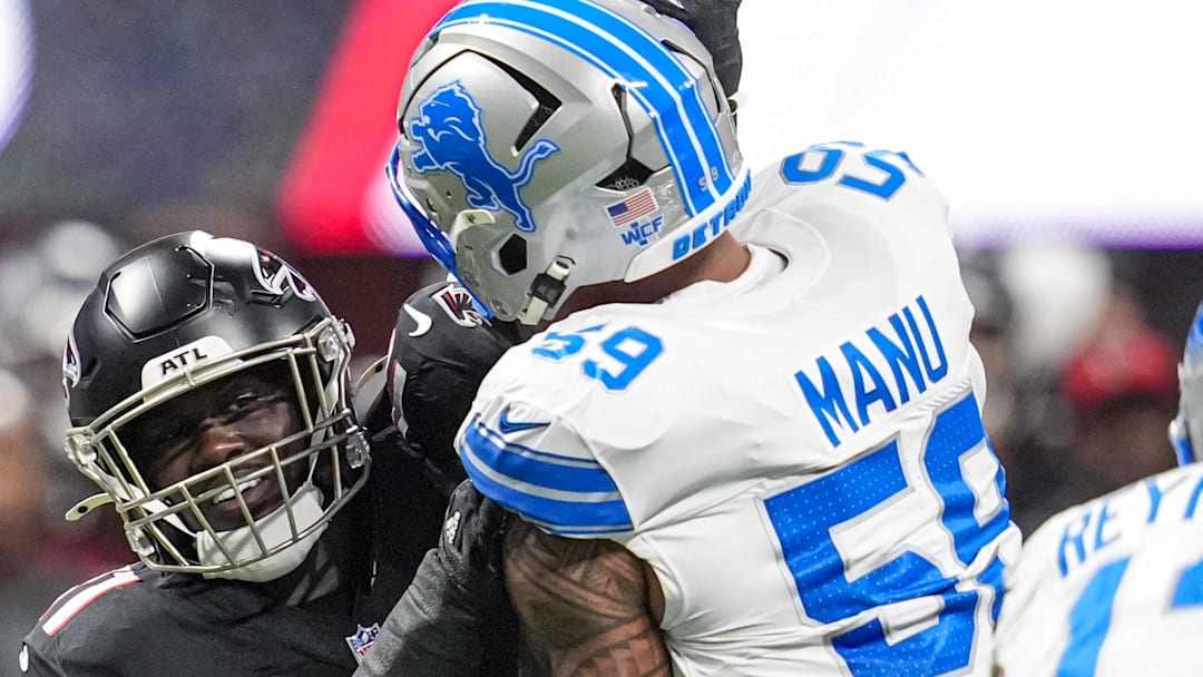 Atlanta Falcons linebacker Jalon Walker (11) works against Detroit Lions offensive tackle Giovanni Manu (59) 