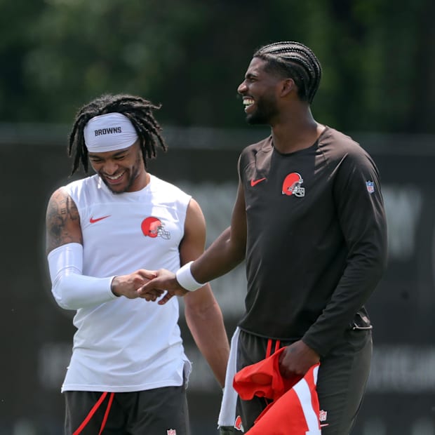 Browns quarterback Shedeur Sanders (right) chats with wide receiver Gage Larvadain after practice, Tuesday, June 10, 2025, in
