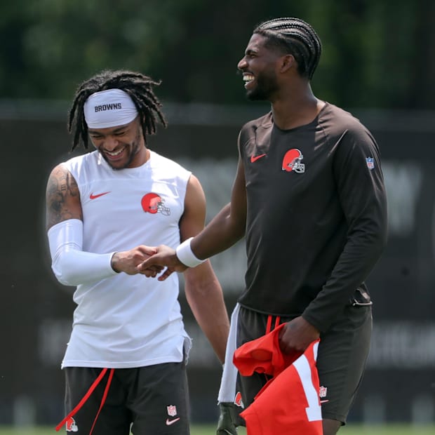 Browns quarterback Shedeur Sanders (right) chats with wide receiver Gage Larvadain after practice, Tuesday, June 10, 2025, in