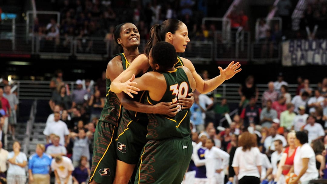 Sep 5, 2010; Phoenix, AZ, USA; Seattle Storm guard Sue Bird is congratulated by teammates after making the winning basket in game two of the western conference finals in the 2010 WNBA Playoffs at US Airways Center.  The Storm defeated the Mercury 91-88.  Mandatory Credit: Jennifer Stewart-Imagn Images