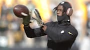 Former Pittsburgh Steelers wide receiver George Pickens warms up before the game against the Green Bay Packers.