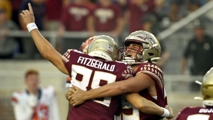 Oct 2, 2021; Tallahassee, Florida, USA; Florida State Seminoles kicker Ryan Fitzgerald (88) and holder Alex Mastromanno (29) celebrate after kicking the game winning field goal against the Syracuse Orange at Doak S. Campbell Stadium. Mandatory Credit: Melina Myers-USA TODAY Sports