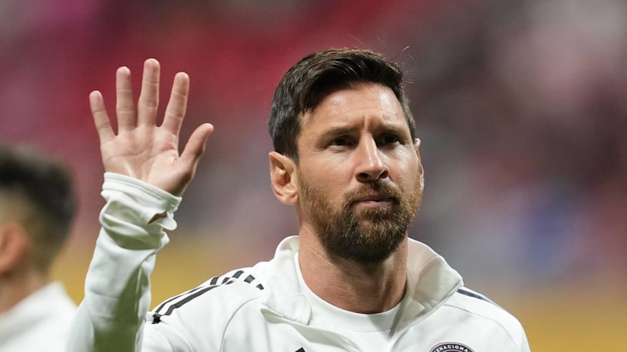 Lionel Messi waving.