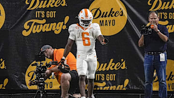 Sep 7, 2024; Charlotte, North Carolina, USA; Tennessee Volunteers running back Dylan Sampson (6) reacts to his touchdown during the second half against the North Carolina State Wolfpack at the Dukes Mayo Classic at Bank of America Stadium. Mandatory Credit: Jim Dedmon-Imagn Images