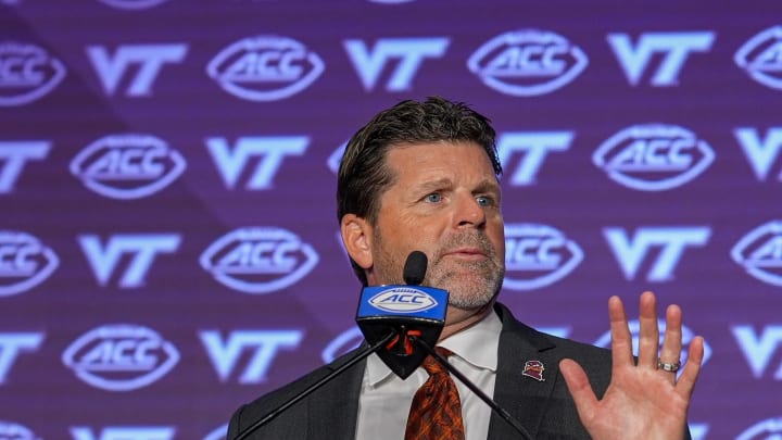 Jul 23, 2024; Charlotte, NC, USA; Virginia Tech head coach Brent Pry answers questions from the media during the ACC Kickoff at Hilton Charlotte Uptown. Mandatory Credit: Jim Dedmon-USA TODAY Sports