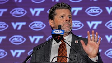 Jul 23, 2024; Charlotte, NC, USA; Virginia Tech head coach Brent Pry answers questions from the media during the ACC Kickoff at Hilton Charlotte Uptown. Mandatory Credit: Jim Dedmon-Imagn Images