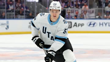Oct 10, 2024; Elmont, New York, USA; Utah Hockey Club defenseman Vladislav Kolyachonok (52) skates with the puck against the New York Islanders during the third period at UBS Arena. Mandatory Credit: Brad Penner-Imagn Images