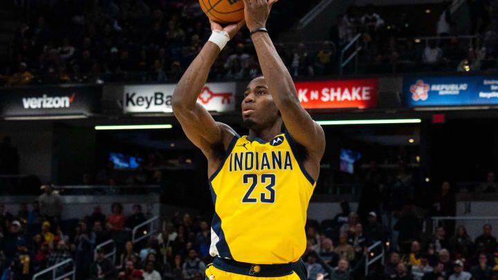 Feb 3, 2023; Indianapolis, Indiana, USA; Indiana Pacers forward Aaron Nesmith (23) shoots the ball  in the second quarter against the Sacramento Kings at Gainbridge Fieldhouse. Mandatory Credit: Trevor Ruszkowski-USA TODAY Sports