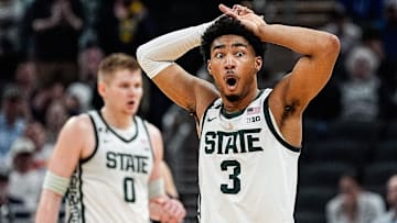 Michigan State guard Jaden Akins reacts to a personal foul against Wisconsin during the second half of Big Ten tournament semifinal at Gainbridge Fieldhouse.