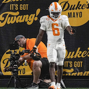 Sep 7, 2024; Charlotte, North Carolina, USA; Tennessee Volunteers running back Dylan Sampson (6) reacts to his touchdown during the second half against the North Carolina State Wolfpack at the Dukes Mayo Classic at Bank of America Stadium. Mandatory Credit: Jim Dedmon-Imagn Images