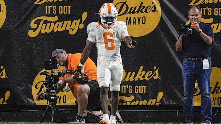 Sep 7, 2024; Charlotte, North Carolina, USA; Tennessee Volunteers running back Dylan Sampson (6) reacts to his touchdown during the second half against the North Carolina State Wolfpack at the Dukes Mayo Classic at Bank of America Stadium. Mandatory Credit: Jim Dedmon-Imagn Images