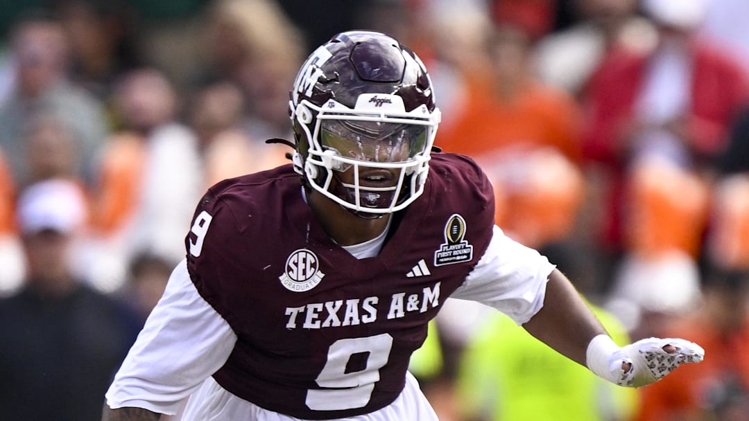 Dec 20, 2025; College Station, TX, USA; Texas A&M Aggies defensive end Cashius Howell (9) rushes the line during the game between the Aggies and the Hurricanes at Kyle Field. Mandatory Credit: Jerome Miron-Imagn Images