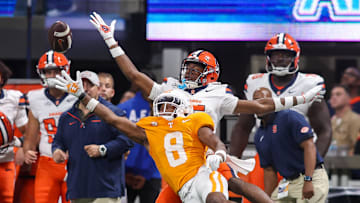Aug 30, 2025; Atlanta, Georgia, USA; Tennessee Volunteers defensive back Colton Hood (8) breaks up a pass intended for Syracuse Orange wide receiver Darrell Gill Jr. (15) in the fourth quarter at Mercedes-Benz Stadium. Mandatory Credit: Brett Davis-Imagn Images