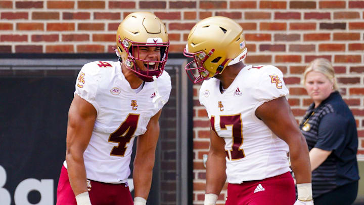 Sep 14, 2024; Columbia, Missouri, USA; Boston College Eagles wide receiver Reed Harris (4) celebrates with tight end Jeremiah Franklin (17) after scoring against the Missouri Tigers during the first half at Faurot Field at Memorial Stadium. Mandatory Credit: Denny Medley-Imagn Images