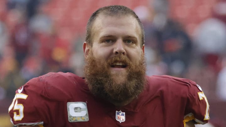 Washington Football Team guard Brandon Scherff smiles while leaving the field after the game against the Tampa Bay Buccaneers. Washington Football Team guard Brandon Scherff smiles while leaving the field after the game against the Tampa Bay Buccaneers.