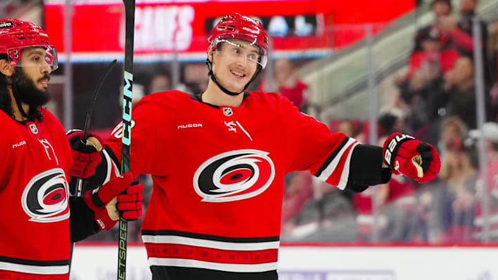Nov 17, 2024; Raleigh, North Carolina, USA;  Carolina Hurricanes center Martin Necas (88) celebrates his goal against the St. Louis Blues during the third period at Lenovo Center. Mandatory Credit: James Guillory-Imagn Images