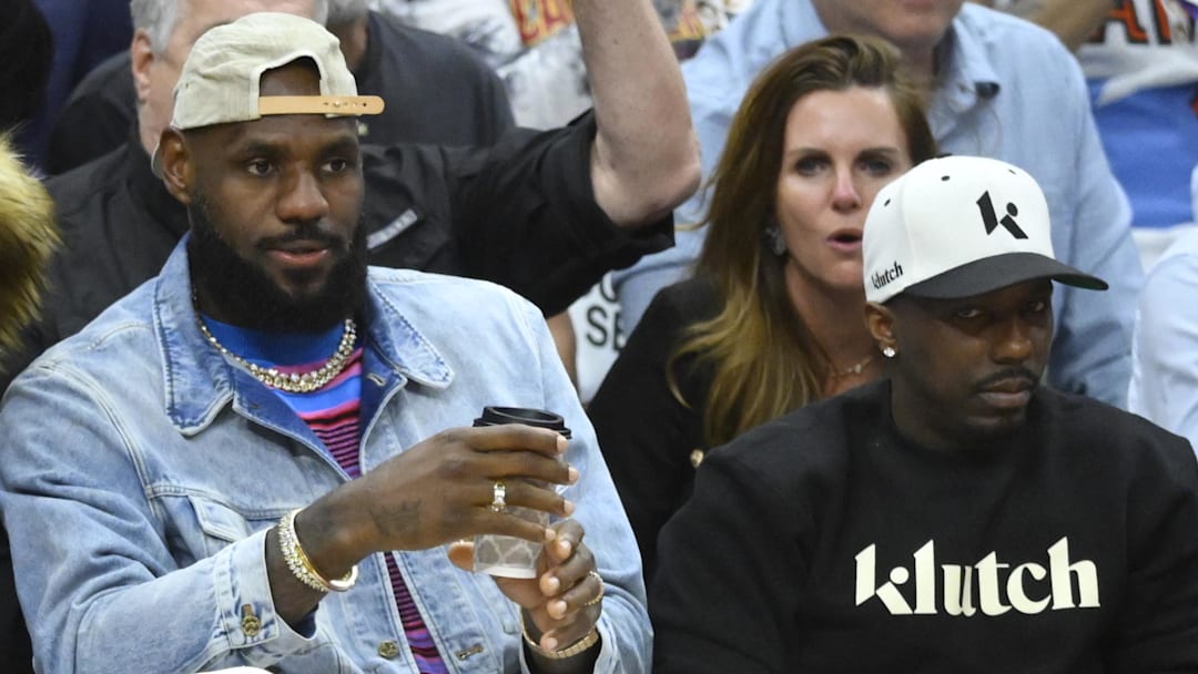 May 13, 2024; Cleveland, Ohio, USA; Savannah James, LeBron James and Rich Paul sit in the front in the fourth quarter of game four of the second round for the 2024 NBA playoffs between the Cleveland Cavaliers and the Boston Celtics at Rocket Mortgage FieldHouse. Mandatory Credit: David Richard-Imagn Images May 13, 2024; Cleveland, Ohio, USA; Savannah James, LeBron James and Rich Paul sit in the front in the fourth quarter of game four of the second round for the 2024 NBA playoffs between the Cleveland Cavaliers and the Boston Celtics at Rocket Mortgage FieldHouse. Mandatory Credit: David Richard-Imagn Images