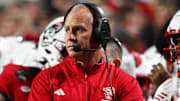 Nov 1, 2025; Raleigh, North Carolina, USA;  NC State Wolfpack head coach Dave Doeren during the first quarter at Carter-Finley Stadium. Mandatory Credit: Zachary Taft-Imagn Images