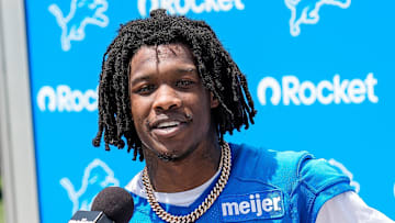 Detroit Lions wide receiver Jameson Williams answers a question after practice during OTAs at team's Performance Center 