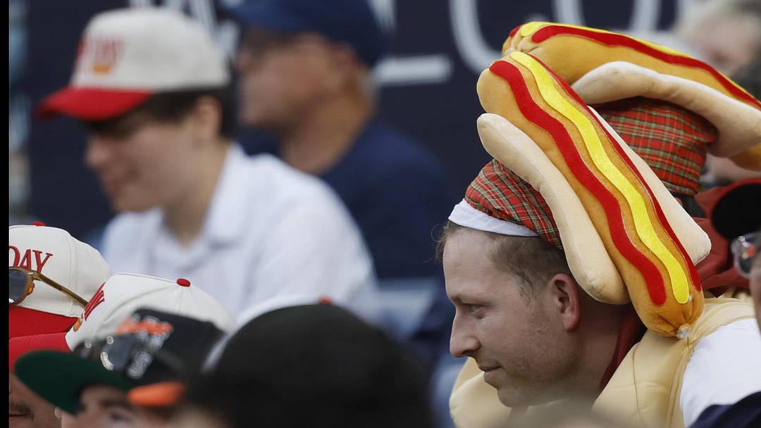 May 15, 2026; Washington, District of Columbia, USA; Fans wear hot dog hats in the stands during Nationals Hot Dog Night against the Baltimore Orioles at Nationals Park. Mandatory Credit: Geoff Burke-Imagn Images