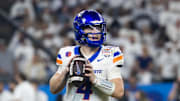 Dec 31, 2024; Glendale, AZ, USA; Boise State Broncos quarterback Maddux Madsen (4) against the Penn State Nittany Lions during the Fiesta Bowl at State Farm Stadium. Mandatory Credit: Mark J. Rebilas-Imagn Images