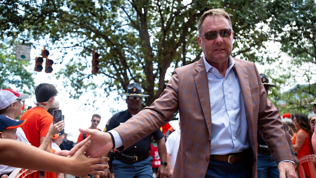 Auburn Tigers head coach Hugh Freeze greets fans during Tiger Walk before Auburn Tigers take on Oklahoma Sooners at Jordan-Hare Stadium in Auburn, Ala., on Saturday, Sept. 28, 2024.