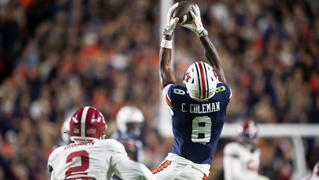 Auburn Tigers wide receiver Cam Coleman (8) catches a pass as Auburn Tigers take on Alabama Crimson Tide in the Iron Bowl at Jordan-Hare Stadium in Auburn, Ala. on Saturday, Nov. 29, 2025. Alabama Crimson Tide defeated Auburn Tigers 27-20.