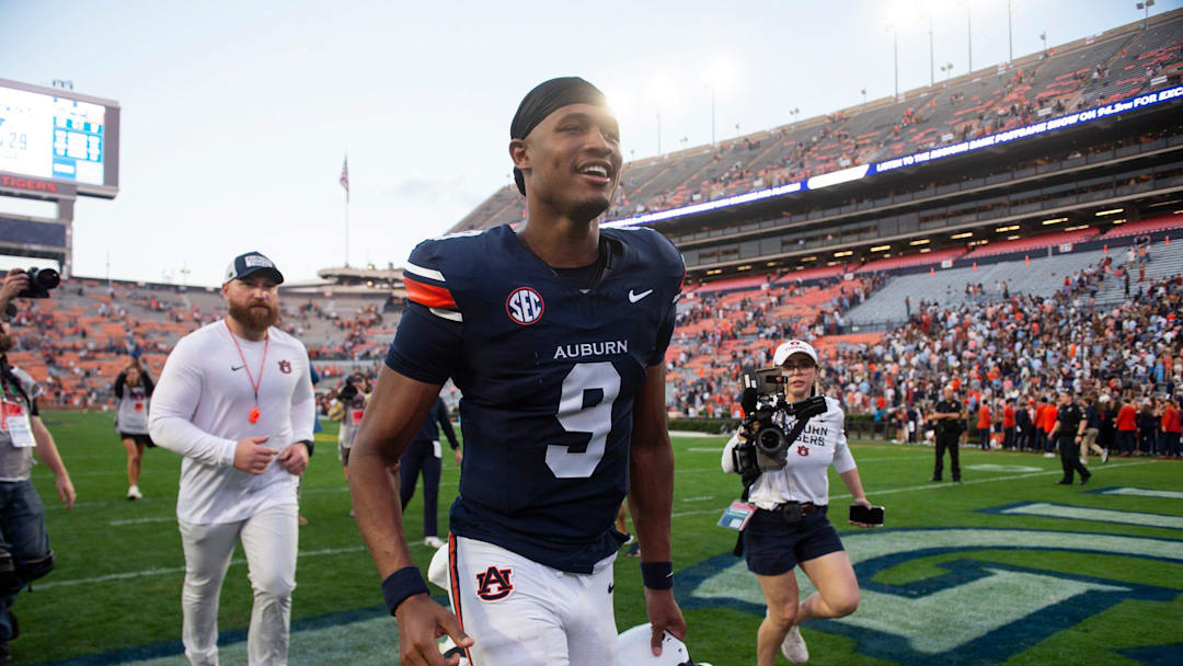Auburn Tigers quarterback Deuce Knight (9) walks off the field after the game as Auburn Tigers take on Mercer Bears at Jordan-Hare Stadium in Auburn, Ala. on Saturday, Nov. 22, 2025. Auburn Tigers defeated the Mercer Bears 62-17.