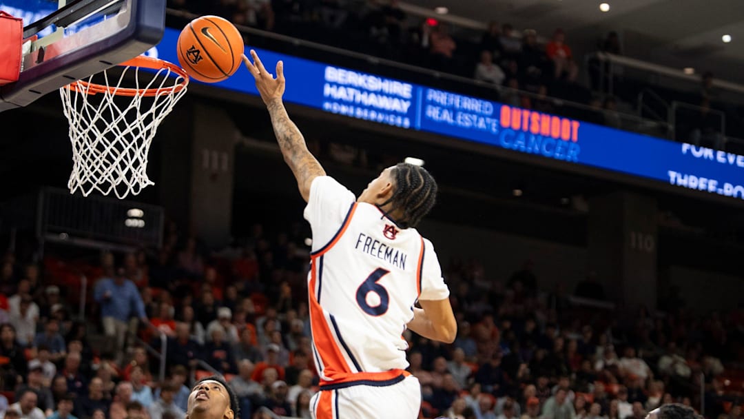 Auburn Tigers guard Elyjah Freeman (6)goes up for a layup as Auburn Tigers take on LSU Tigers at Neville Arena in Auburn, Ala. on Tuesday, March 3, 2026. Auburn Tigers defeated LSU Tigers 88-74.
