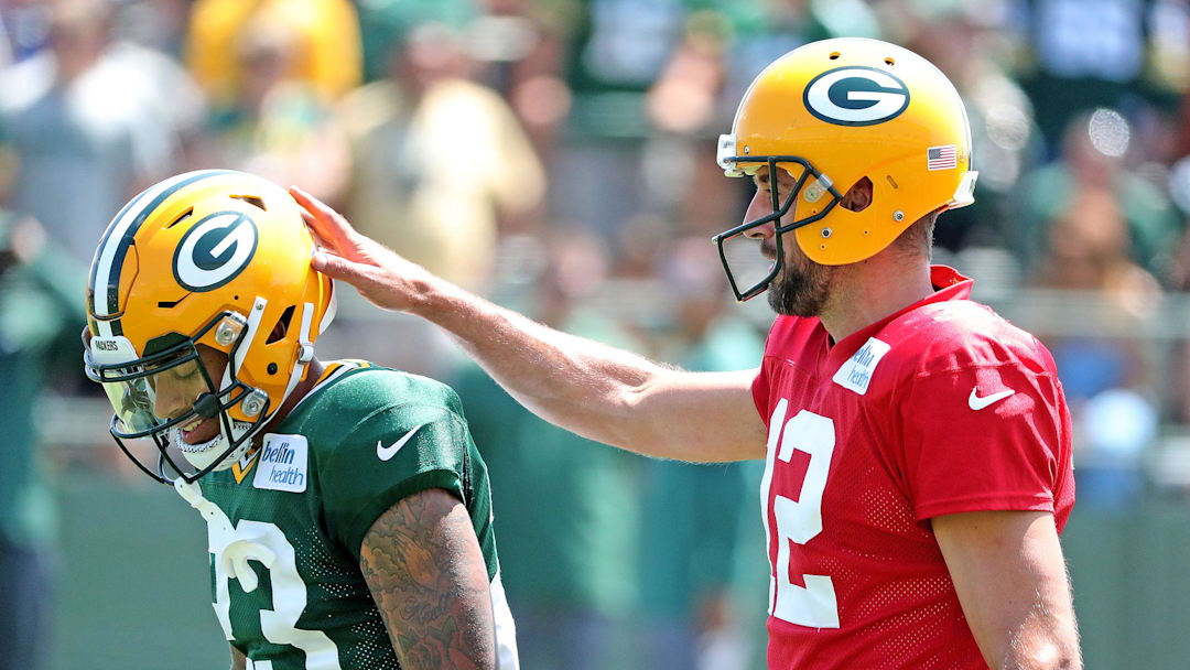 Green Bay Packers quarterback Aaron Rodgers (12) gives cornerback Jaire Alexander (23) and encouraging pat on the helmet during Green Bay Packers Training Camp Saturday, July 28, 2018 at Ray Nitschke Field in Ashwaubenon, Wis

Packers 2018 04