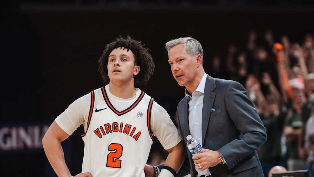 Feb 3, 2026; Charlottesville, Virginia, USA; Virginia Cavaliers guard Chance Mallory (2) talks with head coach Ryan Odom in the second half against the Pittsburgh Panthers at John Paul Jones Arena. Mandatory Credit: Emily Faith Morgan-Imagn Images Feb 3, 2026; Charlottesville, Virginia, USA; Virginia Cavaliers guard Chance Mallory (2) talks with head coach Ryan Odom in the second half against the Pittsburgh Panthers at John Paul Jones Arena. Mandatory Credit: Emily Faith Morgan-Imagn Images