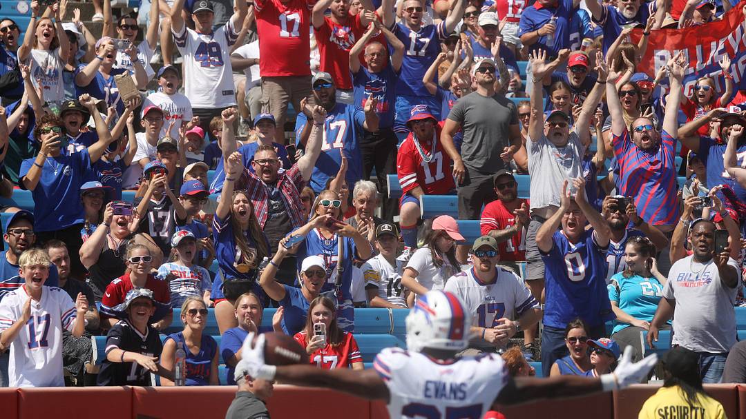 Fans celebrate with the Buffalo Bills' Darrynton Evans after he scored a touchdown during the first half of the preseason game against Carolina Panthers at Highmark Stadium in Orchard Park on Aug. 24, 2024. Fans celebrate with the Buffalo Bills' Darrynton Evans after he scored a touchdown during the first half of the preseason game against Carolina Panthers at Highmark Stadium in Orchard Park on Aug. 24, 2024.
