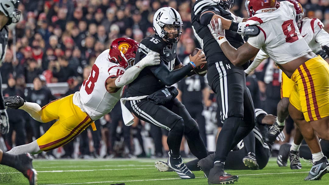 Nebraska quarterback Dylan Raiola is sacked by USC. He would suffer a season-ending injury on the play.