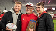 Central Phenix City head coach Pat Nix poses with his sons, Bo, left and Caleb, right, as Central Phenix City faces Thompson in the Class 7A football state championship at Bryant-Denny Stadium in Tuscaloosa, Ala., on Wednesday, Dec. 6, 2023. Central Phenix City defeated Thompson 21-19.