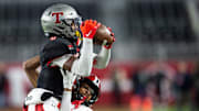 Thompson's Anquon Fegans intercepts the ball as Central Phenix City faces Thompson in the Class 7A football state championship at Bryant-Denny Stadium in Tuscaloosa, Ala., on Wednesday, Dec. 6, 2023. Central Phenix City leads Thompson 14-3 at halftime.