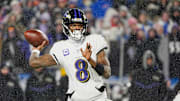 Baltimore Ravens quarterback Lamar Jackson gets off a pass during first half action during the Buffalo Bills divisional game