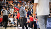 Ole Miss Rebels head coach Chris Beard talks with his team as Auburn Tigers take on Ole Miss Rebels at Neville Arena in Auburn, Ala., on Wednesday, Feb. 26, 2025.