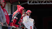 Ohio State Buckeye fans watch as the players head to the locker room at Ohio Stadium before the spring game.