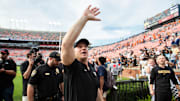 Vanderbilt Commodores head coach Clark Lea celebrates with fans after the game as Auburn Tigers take on Vanderbilt Commodores at Jordan-Hare Stadium in Auburn, Ala., on Saturday, Nov. 2, 2024. Vanderbilt Commodores defeated Auburn Tigers 17-7.
