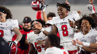 Central Phenix City's Cameron Coleman (8) celebrates with his team as the Red Devils defeated Thompson in the AHSAA Class 7A football state championship at Bryant-Denny Stadium in Tuscaloosa, Alabama. CPC returns to 7A in 2024 while five of the other six Alabama state football champions have moved up a class.