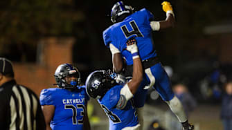 Catholic's Jamarion Williams (4) celebrates his touchdown run at Montgomery Catholic Preparatory School in Montgomery, Ala., on Friday, Nov. 29, 2024. Montgomery Catholic leads Vigor 14-7 at halftime.