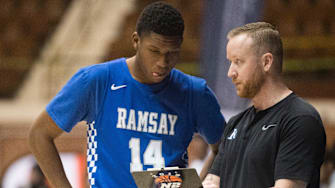 Ramsay coach Denton Johnson talks with Ramsay's Gabriel Allman (14) during a break in the action during the Class 5A boys Southeast Regional semifinal at Garrett Coliseum in Montgomery, Ala., on Saturday, Feb. 15, 2020.

Jc Bballgreenville 13
