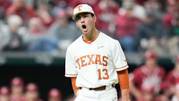 Feb 17, 2023; Arlington, TX, USA; Texas pitcher Lucas Gordon (13) reacts after recording a strikeout in the second inning against the Arkansas during the College Baseball Showdown at Globe Life Field. Mandatory Credit: Chris Jones-Imagn Images